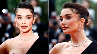 Lastly, Amy Jackson chose a side-parted slicked-back bun, subtle eye shadow, glossy rose lip shade, mascara on the lashes, feathered brows, winged eyeliner, rouged cheekbones, and a dewy base for the glam picks.&nbsp; (Reuters)