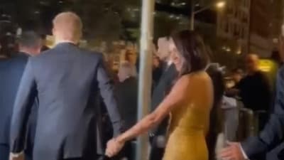 Prince Harry and his wife Meghan exit Manhattan’s Ziegfeld Ballroom. (AP)