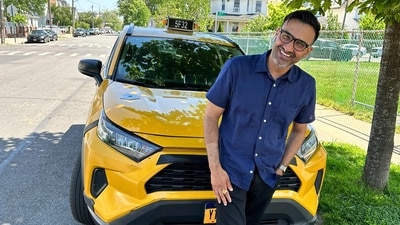 New York City cab driver Sukhcharn Singh poses for a photo with his taxi in the Queens borough of New York. (AP)