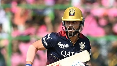 Royal Challengers Bangalore's Virat Kohli runs between the wickets during the Indian Premier League (IPL) Twenty20 cricket match between Rajasthan Royals and Royal Challengers Bangalore at the Sawai Mansingh Stadium in Jaipur on May 14, 2023. (Photo by Sajjad HUSSAIN / AFP) (AFP) Royal Challengers Bangalore's Virat Kohli runs between the wickets during the Indian Premier League (IPL) Twenty20 cricket match between Rajasthan Royals and Royal Challengers Bangalore at the Sawai Mansingh Stadium in Jaipur on May 14, 2023. (Photo by Sajjad HUSSAIN / AFP) (AFP)
