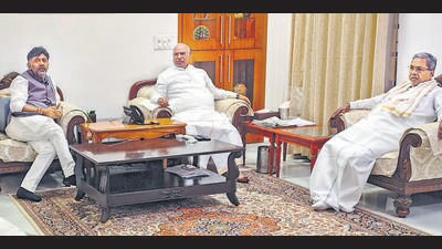 Congress chief Mallikarjun Kharge (centre) with senior party leaders Siddaramaiah (R) and DK Shivakumar in New Delhi. (PTI) Congress chief Mallikarjun Kharge (centre) with senior party leaders Siddaramaiah (R) and DK Shivakumar in New Delhi. (PTI)