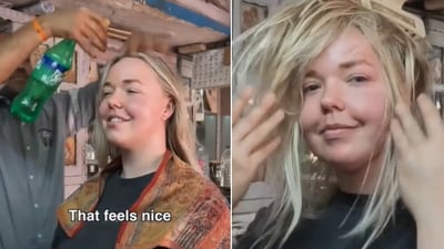 The image shows the Australia tourist getting a 'Cosmic head massage' from a Indian barber. (YouTube/@josieliftsthings) The image shows the Australia tourist getting a 'Cosmic head massage' from a Indian barber. (YouTube/@josieliftsthings)