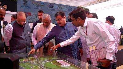 Nitin Gadkari, Union minister for road transport and highways inspect the layout plan of Dwarka expressway at National Highway-48 cloverleaf near Kherki Daula toll plaza, in Gurugram, on Thursday. (Parveen Kumar/HT photo) Nitin Gadkari, Union minister for road transport and highways inspect the layout plan of Dwarka expressway at National Highway-48 cloverleaf near Kherki Daula toll plaza, in Gurugram, on Thursday. (Parveen Kumar/HT photo)