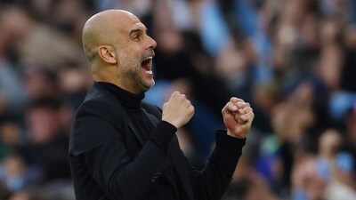 Manchester City manager Pep Guardiola celebrates their first goal scored by Bernardo Silva (REUTERS)