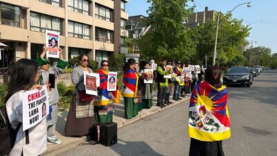 Tibetan activists protesting outside the Chinese Consulate in Toronto on Wednesday to mark the anniversary of the date when the current Panchen Lama was taken into custody. (RTYC Toronto) Tibetan activists protesting outside the Chinese Consulate in Toronto on Wednesday to mark the anniversary of the date when the current Panchen Lama was taken into custody. (RTYC Toronto)