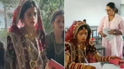 The image shows a bride taking exam in her wedding attire. (Twitter/@ANINewsUP) The image shows a bride taking exam in her wedding attire. (Twitter/@ANINewsUP)