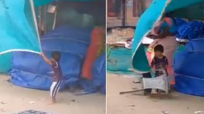 The image shows a kid saving a makeshift shop during a storm. (Twitter/@AlongImna) The image shows a kid saving a makeshift shop during a storm. (Twitter/@AlongImna)