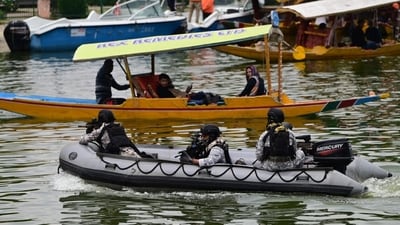 Indian Navy's Marine Commandos intensify patrols on the serene waters of Dal Lake in Srinagar, as security fortification commences in anticipation of the high-profile G20 Tourism Working Group meeting in Jammu and Kashmir, hosting delegates from G20 nations. (Waseem Andrabi/HT Photo) Indian Navy's Marine Commandos intensify patrols on the serene waters of Dal Lake in Srinagar, as security fortification commences in anticipation of the high-profile G20 Tourism Working Group meeting in Jammu and Kashmir, hosting delegates from G20 nations. (Waseem Andrabi/HT Photo)