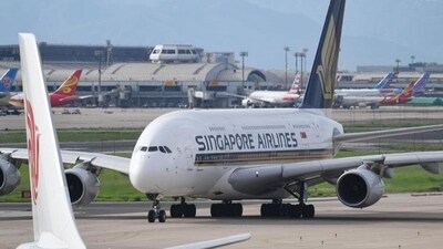 Singapore Airlines and its budget offshoot Scoot carried 26.5 million passengers in the year. (Representational Image) (AFP Photo) Singapore Airlines and its budget offshoot Scoot carried 26.5 million passengers in the year. (Representational Image) (AFP Photo)