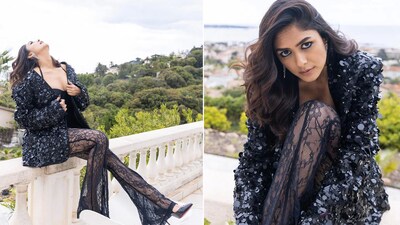Mrunal Thakur made her Cannes debut in a black lace pantsuit and sequined jacket. The actor posted pictures from her terrace photoshoot on Instgaram. Mrunal Thakur made her Cannes debut in a black lace pantsuit and sequined jacket. The actor posted pictures from her terrace photoshoot on Instgaram. 