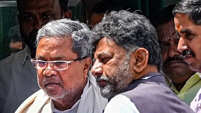 Siddaramaiah and DK Shivakumar at the residence of party leader KC Venugopal for a meeting, in New Delhi. (PTI) Siddaramaiah and DK Shivakumar at the residence of party leader KC Venugopal for a meeting, in New Delhi. (PTI)