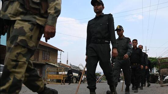 Central security forces patrol the streets of Churachandpur in Manipur after violence broke out in Manipur in early May. (AFP File Photo)