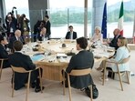 (Clockwise L to R) France's President Emmanuel Macron, Japan's Prime Minister Fumio Kishida, US President Joe Biden, Germany's Chancellor Olaf Scholz, Britain's Prime Minister Rishi Sunak, European Commission President Ursula von der Leyen, European Council President Charles Michel, Italy's Prime Minister Giorgia Meloni and Canada's Prime Minister Justin Trudeau attend a working lunch meeting at the start of the G7 Leaders' Summit in Hiroshima on May 19, 2023. (Clockwise L to R) France's President Emmanuel Macron, Japan's Prime Minister Fumio Kishida, US President Joe Biden, Germany's Chancellor Olaf Scholz, Britain's Prime Minister Rishi Sunak, European Commission President Ursula von der Leyen, European Council President Charles Michel, Italy's Prime Minister Giorgia Meloni and Canada's Prime Minister Justin Trudeau attend a working lunch meeting at the start of the G7 Leaders' Summit in Hiroshima on May 19, 2023.
