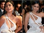 Mrunal Thakur debuts on 2023 Cannes Film Festival red carpet in a risqué gown. Mrunal Thakur debuts on 2023 Cannes Film Festival red carpet in a risqué gown.