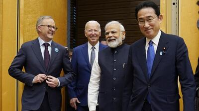 (From left) Australian PM Anthony Albanese, US President Joe Biden and Indian PM Narendra Modi are greeted by Japanese PM Fumio Kishida (right), during their arrival to the Quad leaders summit at Kantei Palace in Tokyo, Japan, on May 24, 2022. (AP) (From left) Australian PM Anthony Albanese, US President Joe Biden and Indian PM Narendra Modi are greeted by Japanese PM Fumio Kishida (right), during their arrival to the Quad leaders summit at Kantei Palace in Tokyo, Japan, on May 24, 2022. (AP)