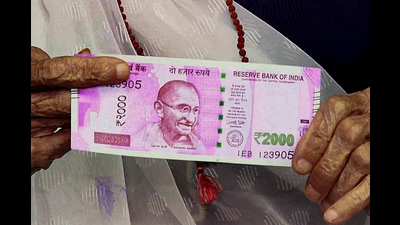 Banks will start exchanging notes from May 23 and people can exchange ₹2,000 banknotes up to a limit of ₹20,000 at a time. (PTI) Banks will start exchanging notes from May 23 and people can exchange ₹2,000 banknotes up to a limit of ₹20,000 at a time. (PTI)