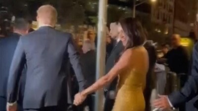 Prince Harry and his wife Meghan Markle exit Manhattan’s Ziegfeld Ballroom. (AP) Prince Harry and his wife Meghan Markle exit Manhattan’s Ziegfeld Ballroom. (AP)