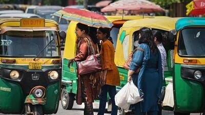 Commuters out on a hot day near INA Market in New Delhi, on Friday. (Raj K Raj/HT) Commuters out on a hot day near INA Market in New Delhi, on Friday. (Raj K Raj/HT)