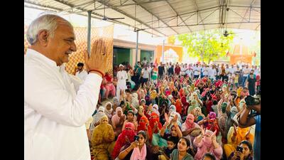 Former CM Bhupinder Singh Hooda interacting with villagers in his constituency Garhi-Sampla-Kiloi in Rohtak.