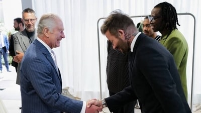 David Beckham meets King Charles.
