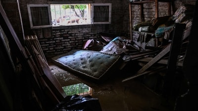 A flooded basement is pictured on May 19, 2023 in Faenza, after floodwaters hit the Emilia-Romagna region. Thousands have been driven from their homes and crops destroyed in an area known as the country's orchard. (AFP) A flooded basement is pictured on May 19, 2023 in Faenza, after floodwaters hit the Emilia-Romagna region. Thousands have been driven from their homes and crops destroyed in an area known as the country's orchard. (AFP)
