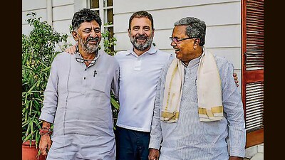 Karnataka CM-designate Siddaramaiah and Deputy CM-designate D.K. Shivakumar meet Congress leader Rahul Gandhi in New Delhi, Friday. (PTI) Karnataka CM-designate Siddaramaiah and Deputy CM-designate D.K. Shivakumar meet Congress leader Rahul Gandhi in New Delhi, Friday. (PTI)