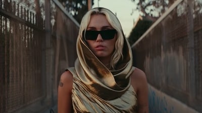 Miley Cyrus says her song Flowers initially had different lyrics. (Twitter) Miley Cyrus says her song Flowers initially had different lyrics. (Twitter)