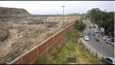 The Chandigarh MC has been dumping the garbage at a dumping ground, spread over 45 acres of land, near Dadumajra colony over the past decades. (HT File Photo) The Chandigarh MC has been dumping the garbage at a dumping ground, spread over 45 acres of land, near Dadumajra colony over the past decades. (HT File Photo)