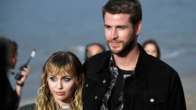 Miley Cryus and Liam Hemsworth (Getty Images) Miley Cryus and Liam Hemsworth (Getty Images)