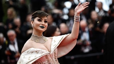 Urvashi Rautela attended the screening of Indiana Jones and the Dial of Destiny in a blue and white ball gown. (AFP) Urvashi Rautela attended the screening of Indiana Jones and the Dial of Destiny in a blue and white ball gown. (AFP)