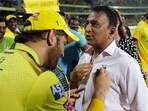 MS Dhoni signs on the shirt of India's batting legend Sunil Gavaskar MS Dhoni signs on the shirt of India's batting legend Sunil Gavaskar
