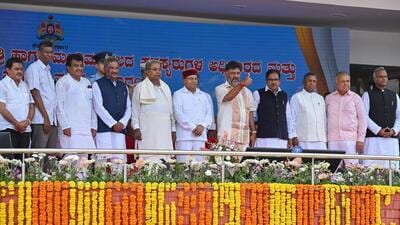Governor of India's state of Karnataka, Thaawarchand Gehlot (C) along with newly sworn in Chief Minister of state, Siddaramaiah (C-L) and his deputy, DK Shivakumar (C-R) along with newly sworn in cabinet ministers pose for pictures after the swearing in function, in Bengaluru on May 20, 2023. (Photo by Manjunath KIRAN / AFP) (AFP) Governor of India's state of Karnataka, Thaawarchand Gehlot (C) along with newly sworn in Chief Minister of state, Siddaramaiah (C-L) and his deputy, DK Shivakumar (C-R) along with newly sworn in cabinet ministers pose for pictures after the swearing in function, in Bengaluru on May 20, 2023. (Photo by Manjunath KIRAN / AFP) (AFP)