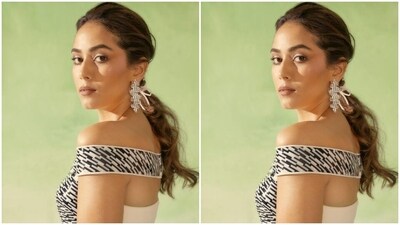 Mira looked every bit gorgeous in a white gown, with a bodice featuring black and white stripes with off-shoulders, and a long train. (Instagram/@mira.kapoor) Mira looked every bit gorgeous in a white gown, with a bodice featuring black and white stripes with off-shoulders, and a long train. (Instagram/@mira.kapoor)