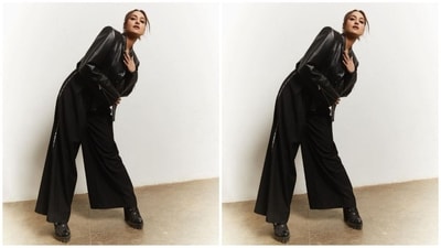 To complement her ensemble, Sonakshi accessorised with black platform heel boots, a black shoulder bag, multiple rings adorning her fingers, and statement hoop earrings. (Instagram/@aslisona) To complement her ensemble, Sonakshi accessorised with black platform heel boots, a black shoulder bag, multiple rings adorning her fingers, and statement hoop earrings. (Instagram/@aslisona)