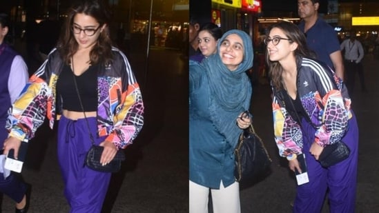 Sara Ali Khan with a fan at the Mumbai airport.