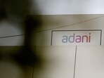 The logo of the Adani Group is seen on one of its buildings in Ahmedabad.