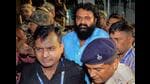 PLFI chief Dinesh Gope being brought after his arrest by NIA, at Birsa Munda Airport in Ranchi, on Sunday. (PTI)