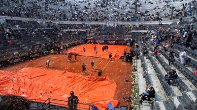 Rain cover is removed form the central court prior to the start of the final match between Denmark's Holger Rune and Russia's Daniil Medvedev at the Italian Open (AP) Rain cover is removed form the central court prior to the start of the final match between Denmark's Holger Rune and Russia's Daniil Medvedev at the Italian Open (AP)
