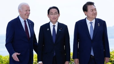 President Joe Biden poses for a photo with Japan's Prime Minister Fumio Kishida and South Korean President Yoon Suk Yeol. (AP) President Joe Biden poses for a photo with Japan's Prime Minister Fumio Kishida and South Korean President Yoon Suk Yeol. (AP)