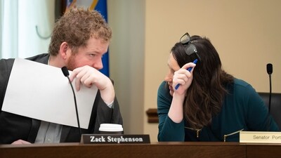 House and Senate cannabis bill authors Rep. Zack Stephenson and Sen. Lindsey Port confer before the start of the final committee conference on the cannabis bill on May 16, 2023, in St. Paul, Minn. Senators in Minnesota passed a bill Saturday, May 20, 2023, that would legalize recreational marijuana for people over the age of 21, making it the 23rd state to legalize adult-use cannabis. (AP) House and Senate cannabis bill authors Rep. Zack Stephenson and Sen. Lindsey Port confer before the start of the final committee conference on the cannabis bill on May 16, 2023, in St. Paul, Minn. Senators in Minnesota passed a bill Saturday, May 20, 2023, that would legalize recreational marijuana for people over the age of 21, making it the 23rd state to legalize adult-use cannabis. (AP)