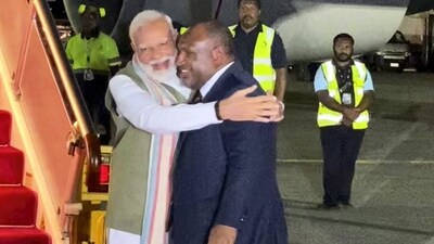 Prime Minister Narendra Modi being received by Prime Minister of Papua New Guinea James Marape upon his arrival on Sunday, (PTI) Prime Minister Narendra Modi being received by Prime Minister of Papua New Guinea James Marape upon his arrival on Sunday, (PTI)