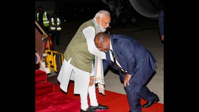 Prime Minister of Papua New Guinea James Marape greets Prime Minister Narendra Modi at Port Moresby on Sunday. (PTI) Prime Minister of Papua New Guinea James Marape greets Prime Minister Narendra Modi at Port Moresby on Sunday. (PTI)