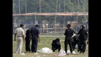Security officials at the site of the blast at Gandhi Maidan in Patna in October 2013. Six persons were killed and 82 people were injured in the incident. (HT Archives) Security officials at the site of the blast at Gandhi Maidan in Patna in October 2013. Six persons were killed and 82 people were injured in the incident. (HT Archives)