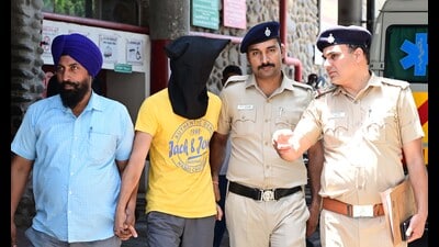 The accused in Chandigarh Police custody on Sunday. (Keshav Singh/HT) The accused in Chandigarh Police custody on Sunday. (Keshav Singh/HT)