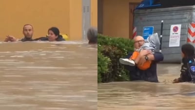 The image, taken from the viral video, shows neighbours rescuing a mother and her daughter. (Instagram/@goodnews_movement) The image, taken from the viral video, shows neighbours rescuing a mother and her daughter. (Instagram/@goodnews_movement)