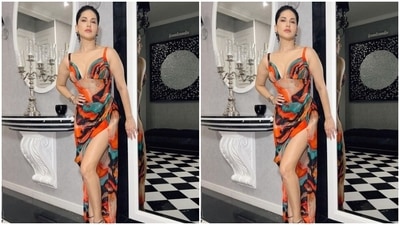 In shades of black, red, orange and blue, the dress hugged Sunny's shape and showed off her hourglass figure. "Such a pretty dress,” Sunny captioned her pictures. We agree. (Instagram/@sunnyleone) In shades of black, red, orange and blue, the dress hugged Sunny's shape and showed off her hourglass figure. "Such a pretty dress,” Sunny captioned her pictures. We agree. (Instagram/@sunnyleone)