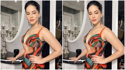 Sunny further accessorised her look for the day in black statement earrings and a bracelet from the house of Shaya. In stilettos with multicoloured sequined details, she completed her look. (Instagram/@sunnyleone) Sunny further accessorised her look for the day in black statement earrings and a bracelet from the house of Shaya. In stilettos with multicoloured sequined details, she completed her look. (Instagram/@sunnyleone)