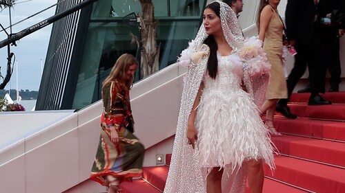 Sapna Choudhary wears a veil for her second appearance at Cannes. Sapna Choudhary wears a veil for her second appearance at Cannes.