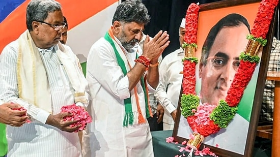 Karnataka Chief Minister Siddaramaiah and Deputy CM DK Shivakumar pay tribute to former prime minister Rajiv Gandhi on his 32nd death anniversary, in Bengaluru on Sunday. (DK Shivkumar Twitter)