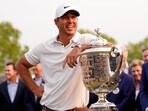 Brooks Koepka celebrates after winning the PGA Championship golf tournament at Oak Hill Country Club.